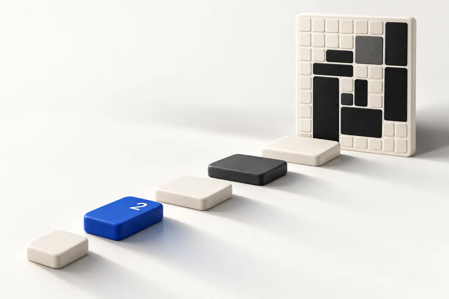 Small ivory, graphite and blue stepping stones lead to a geometric puzzle.